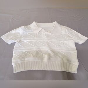 Cider crop top cream in color.